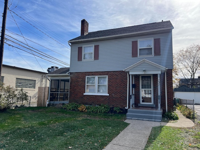 view of front of home featuring a front yard