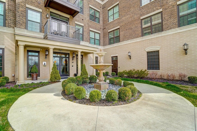 doorway to property with a balcony