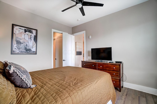 bedroom featuring wood-type flooring and ceiling fan