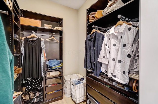 walk in closet featuring light wood-type flooring