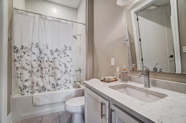 full bathroom with tile patterned flooring, vanity, shower / bath combo, and toilet