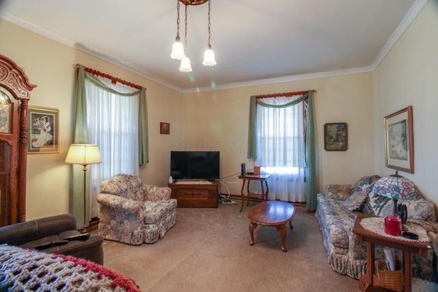 carpeted living room with crown molding and a notable chandelier