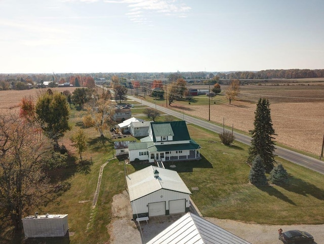 birds eye view of property featuring a rural view