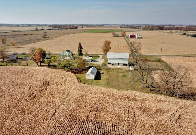 birds eye view of property featuring a rural view