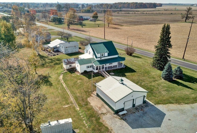 birds eye view of property featuring a rural view