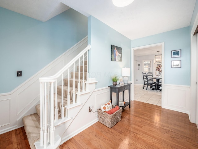 staircase featuring hardwood / wood-style floors