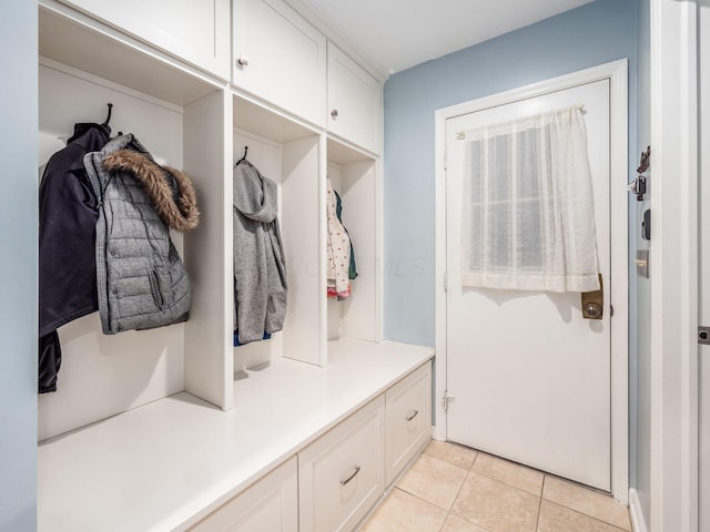 mudroom with light tile patterned flooring