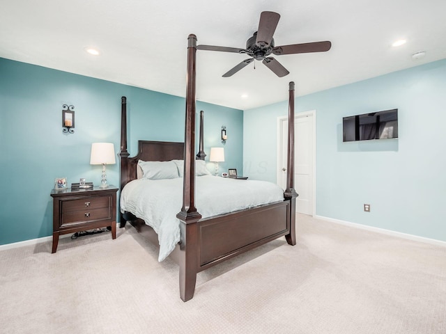 carpeted bedroom featuring ceiling fan