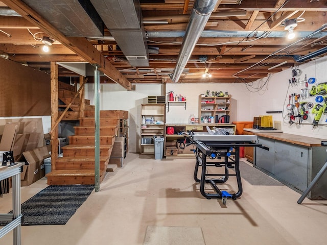 basement with a workshop area