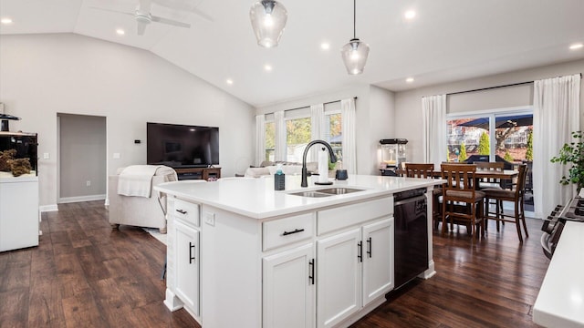 kitchen featuring dark hardwood / wood-style flooring, sink, a center island with sink, black dishwasher, and white cabinetry