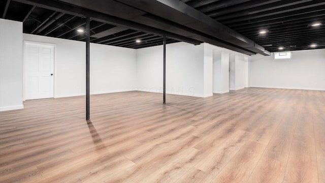 basement with light wood-type flooring