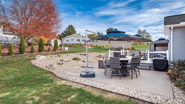 view of patio featuring a gazebo and a deck