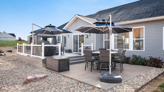 view of patio featuring a wooden deck