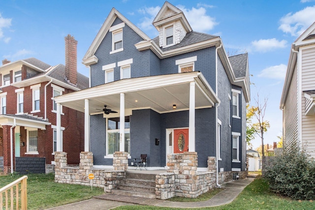 view of front of property with ceiling fan and covered porch