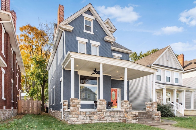 craftsman house with a porch and ceiling fan