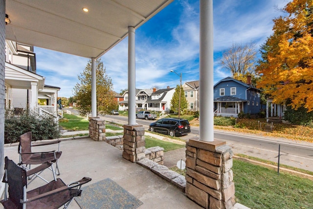 view of patio featuring a porch