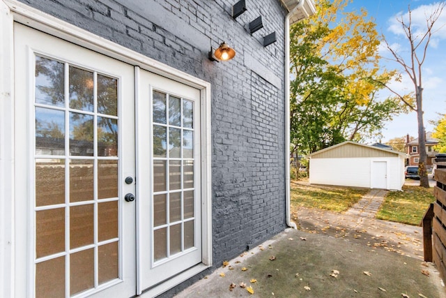 entrance to property with a patio area and french doors