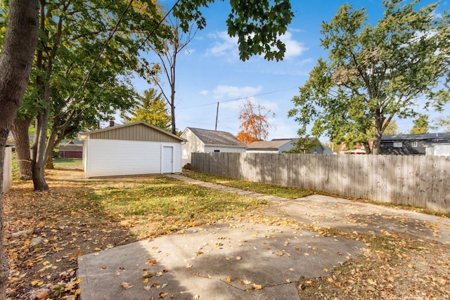 view of yard with a patio and an outdoor structure