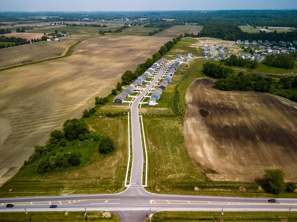 birds eye view of property featuring a rural view