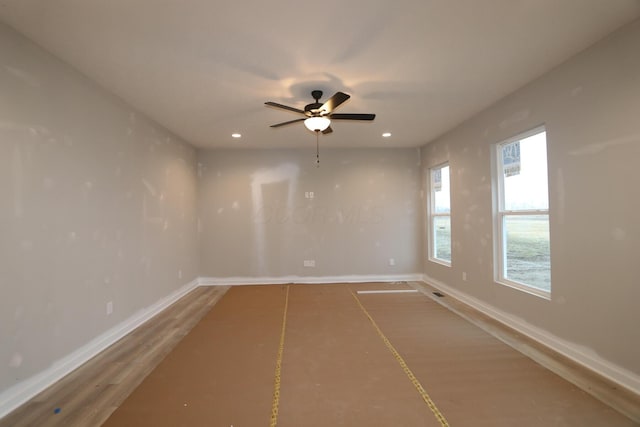 spare room with ceiling fan