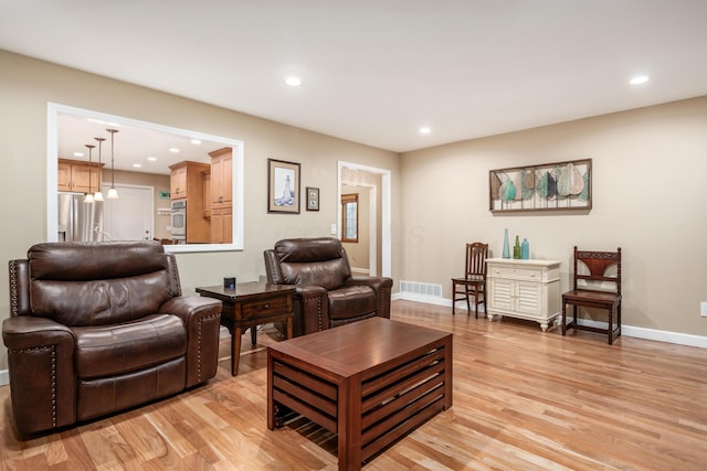 living room with light wood-type flooring