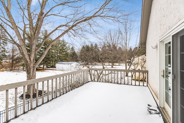 view of snow covered deck