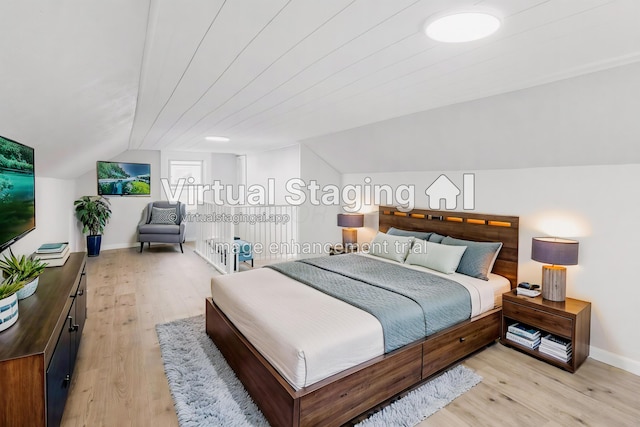 1961 Dartmouth Ave, Columbus, OH 43219 - bedroom with lofted ceiling and light wood-type flooring
