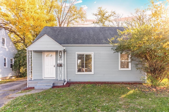 view of front of home with a front yard