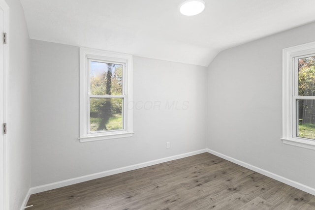 1961 Dartmouth Ave, Columbus, OH 43219 - empty room featuring vaulted ceiling and wood finished floors