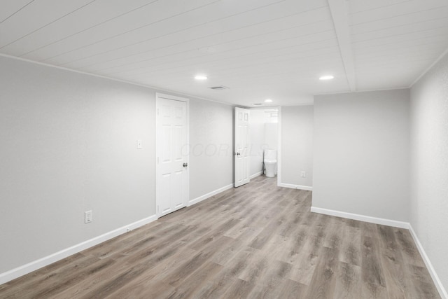 basement featuring light hardwood / wood-style flooring