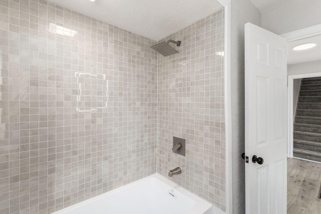 1961 Dartmouth Ave, Columbus, OH 43219 - bathroom featuring shower / washtub combination and wood finished floors