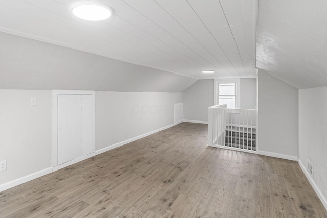 1961 Dartmouth Ave, Columbus, OH 43219 - additional living space with wood finished floors and vaulted ceiling
