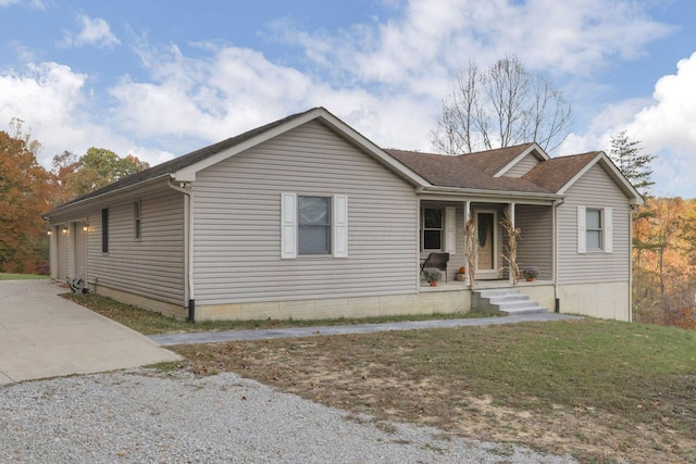 view of front of home with covered porch and a garage