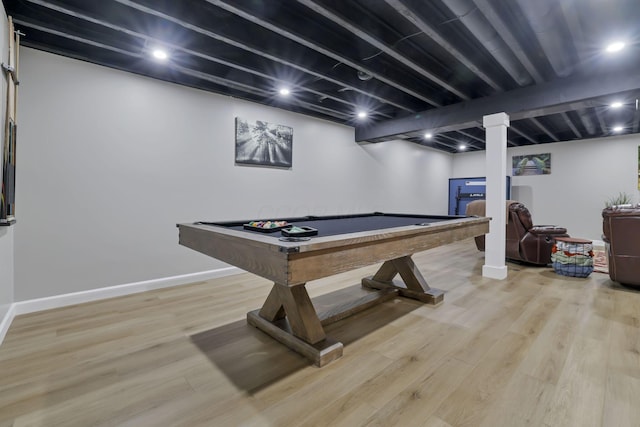 game room with beam ceiling, light wood-type flooring, and pool table