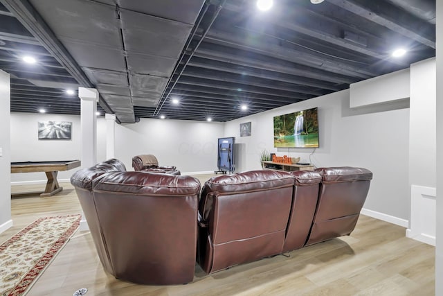 home theater featuring light hardwood / wood-style flooring and billiards