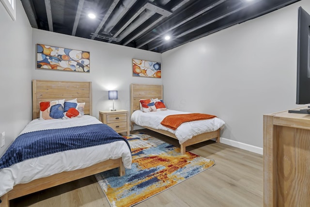 bedroom featuring light hardwood / wood-style floors