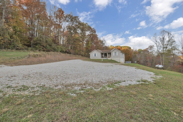 exterior space featuring a front yard