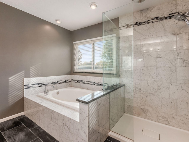 bathroom with tile patterned flooring and plus walk in shower