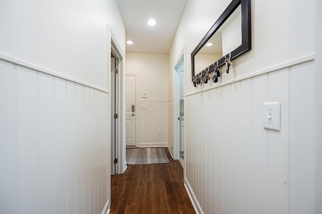 hall with dark hardwood / wood-style floors