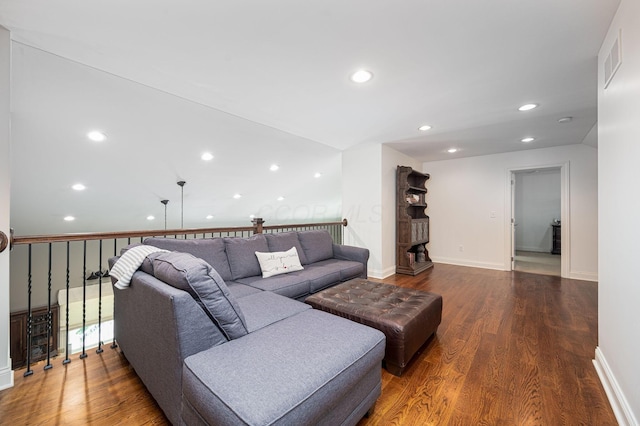 living room with dark wood-type flooring