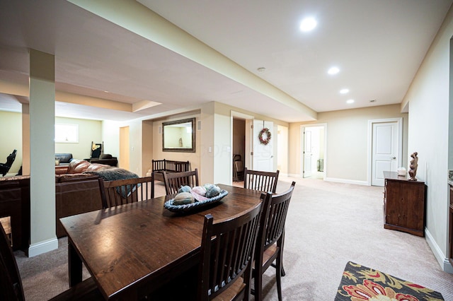 view of carpeted dining area