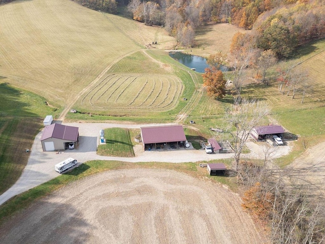 drone / aerial view with a rural view and a water view