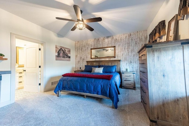 bedroom featuring ceiling fan and light carpet