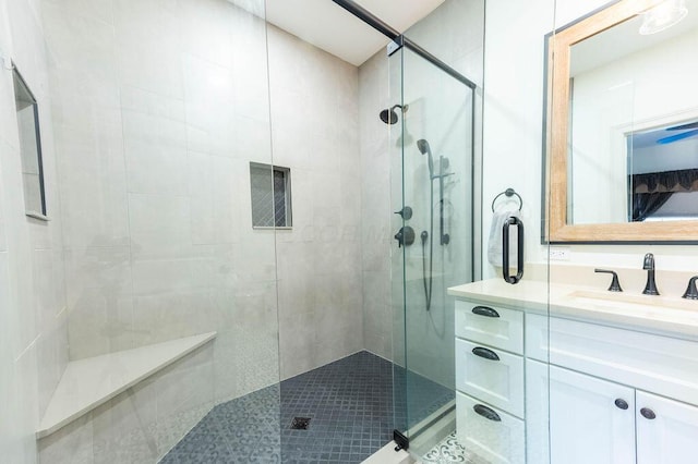 bathroom with vanity and walk in shower