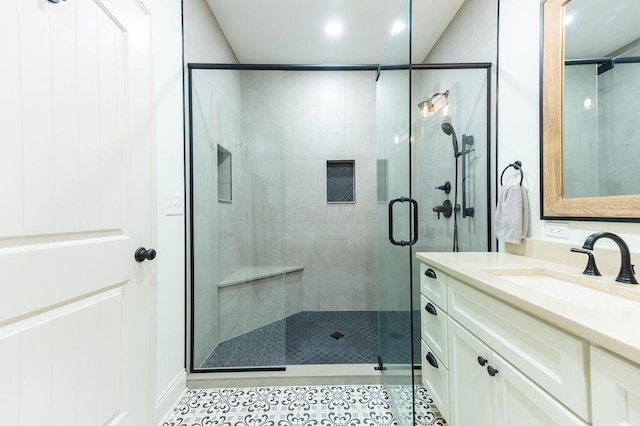 bathroom with vanity and walk in shower