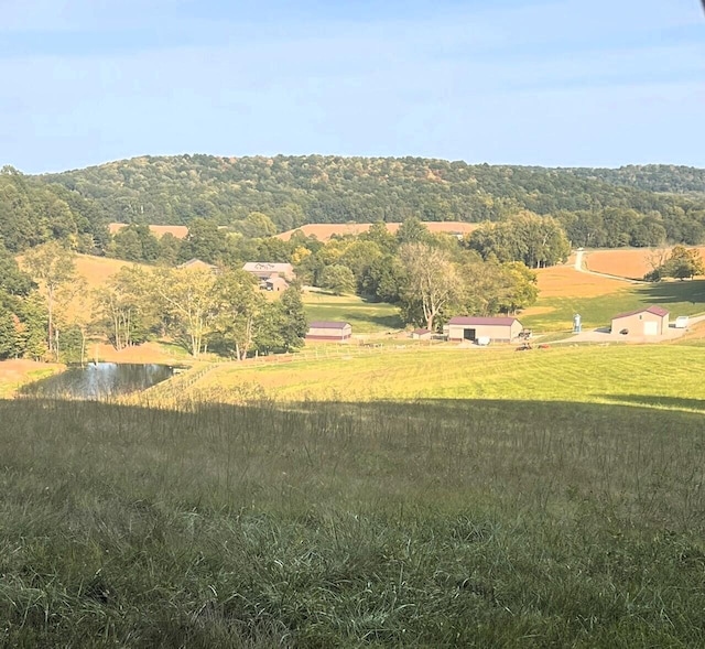 view of mountain feature with a rural view