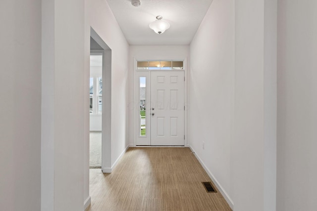 foyer featuring light wood-type flooring