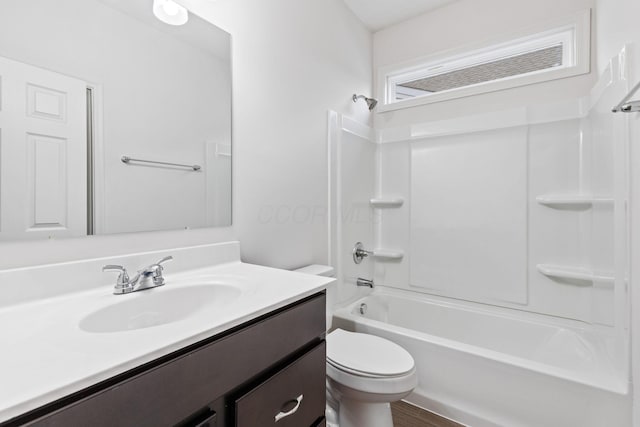 full bathroom with wood-type flooring, vanity, toilet, and tub / shower combination