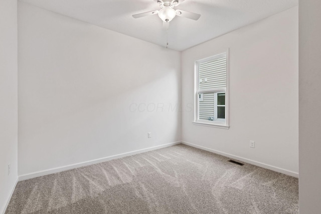 carpeted empty room with ceiling fan