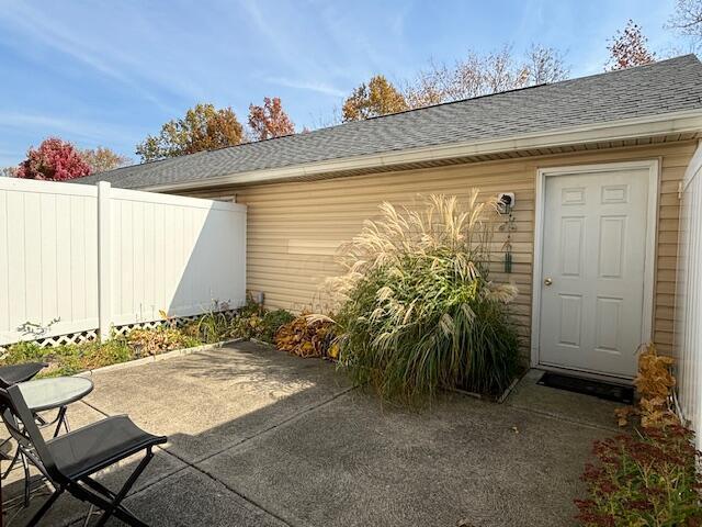 property entrance featuring a patio area